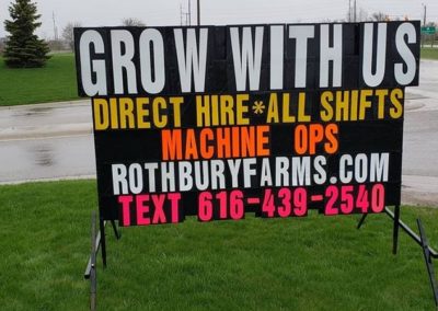Portable signs looking for new staff in Grand Rapids