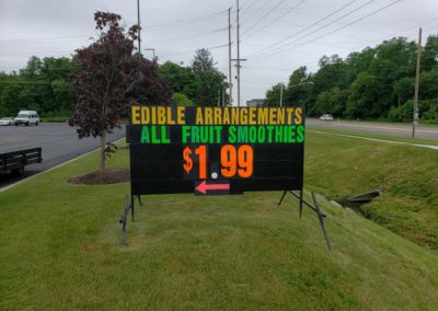 Edible Arrangements Grandville, MI using a Light Bright portable black sign to promote smoothies! YUM!