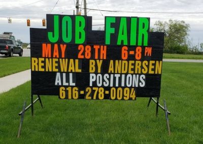 Kentwood job fair advertising with a portable black sign