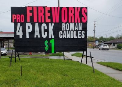 Seasonal sales for Fireworks using a portable neon lettered Light Bright Sign