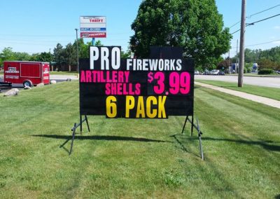 Black signs selling fireworks!