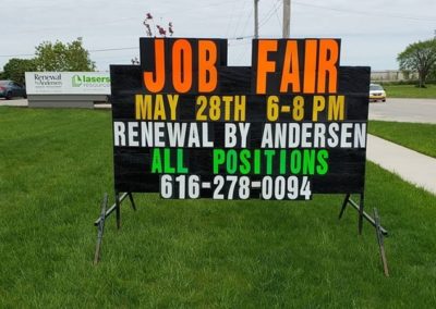 Kentwood job fair advertising with a portable black sign